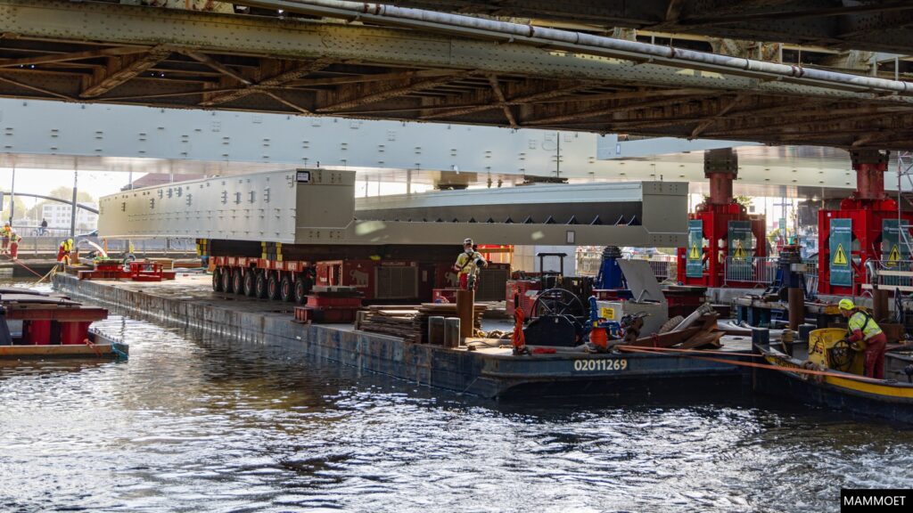 Bridge sections were delivered to site by barge, to save disruption on Amsterdam's busy roads.