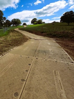 Temporary access road built from mats.