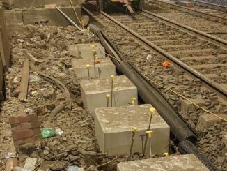 Mainmark UK injected resin beneath 77 foundations at Tottenham Hale station.