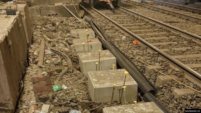 Mainmark UK injected resin beneath 77 foundations at Tottenham Hale station.