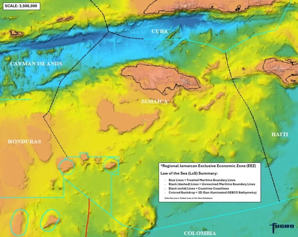 Jamaica's exclusive economic zone extends far beyond the island itself, bounded by settled maritime boundaries (blue) and boundaries still to be resolved (dashed black) over sun-illuminated GEBCO bathymetry.